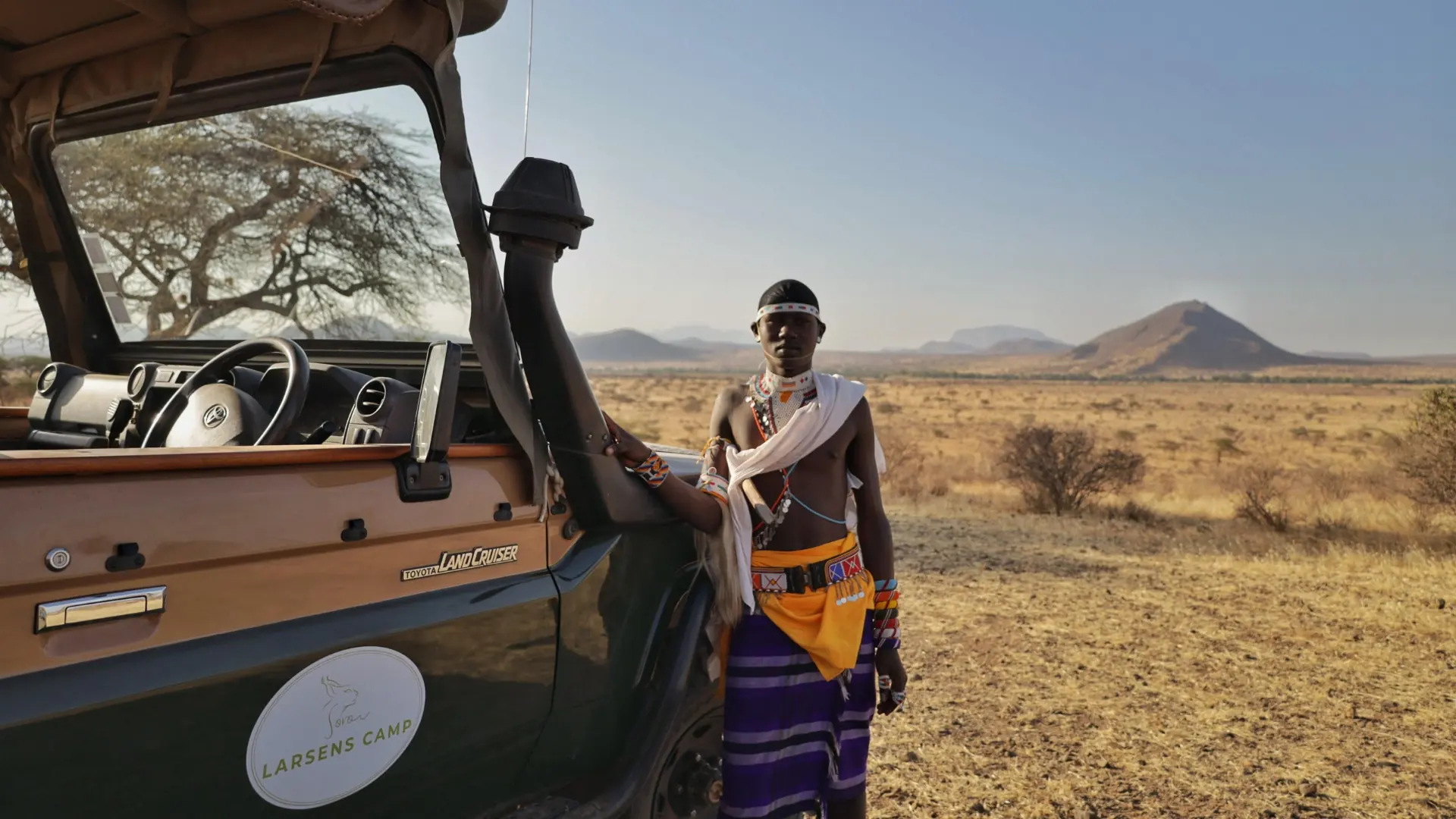 Safari vehicle on a game drive in Samburu