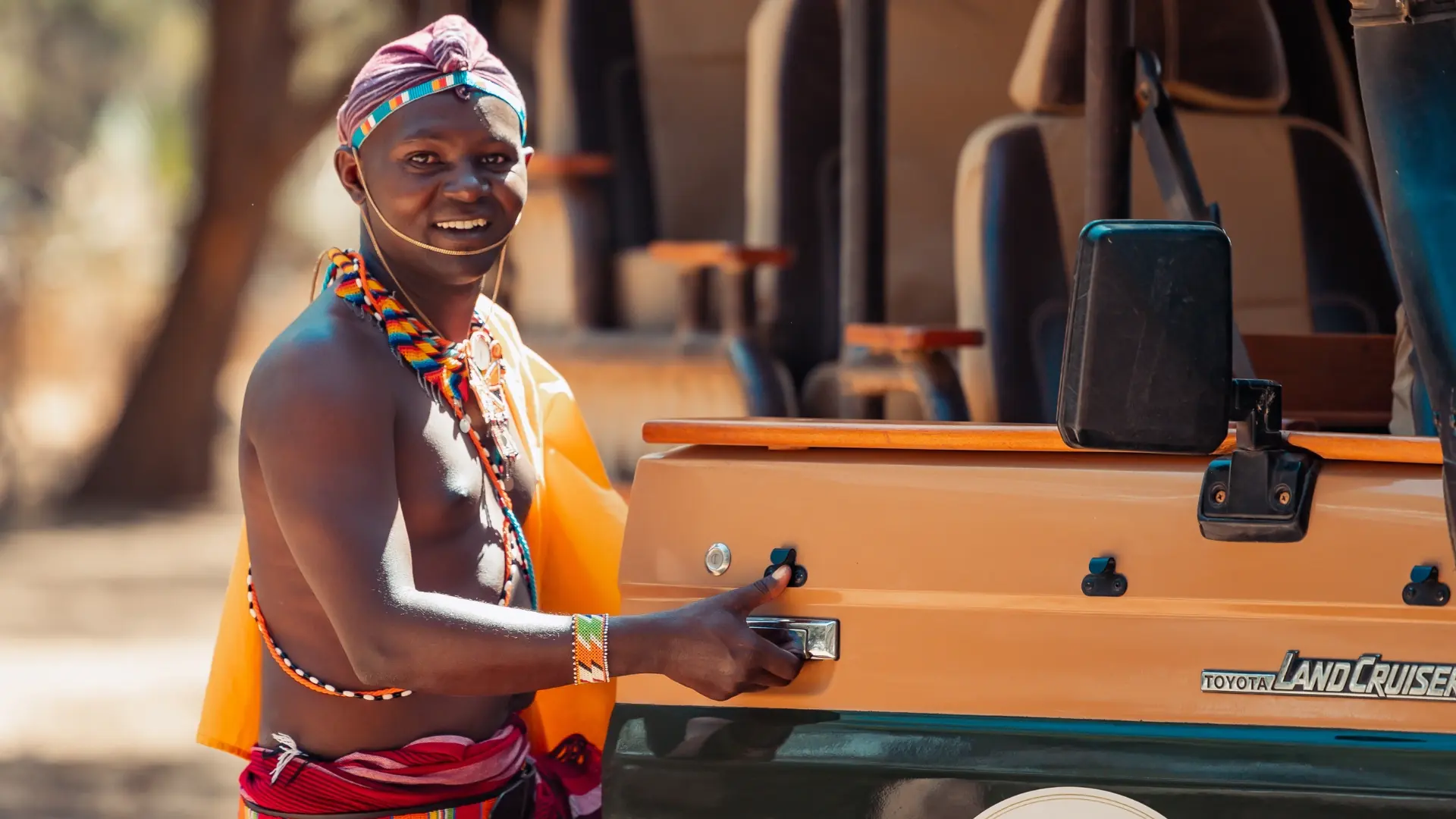 Safari vehicle on a game drive in Samburu